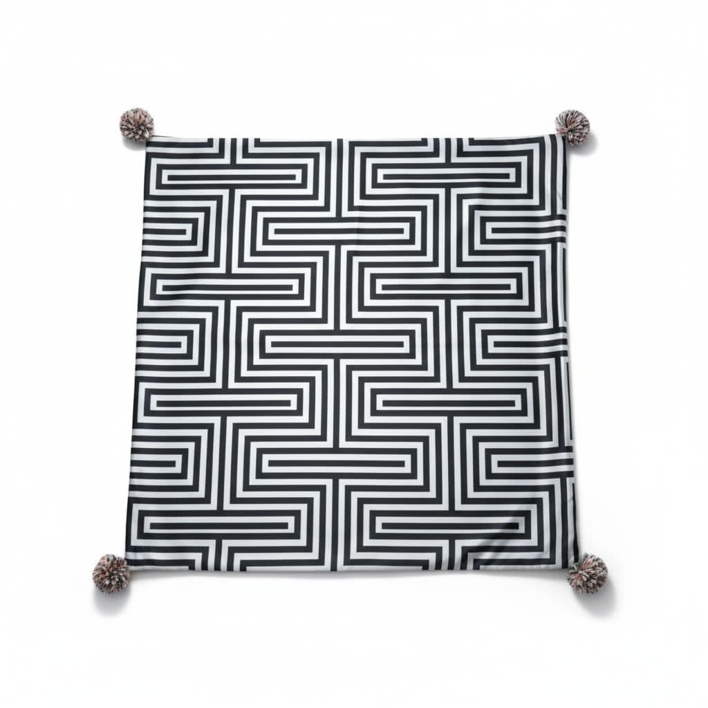 Housse de coussin à pompons – Motif géométrique noir et blanc