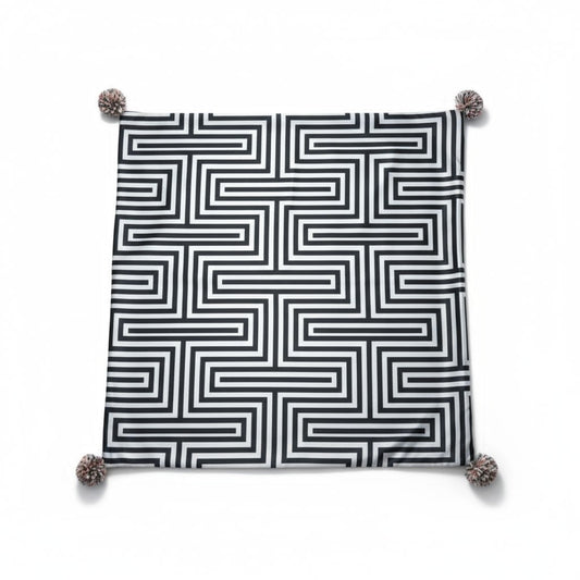 Housse de coussin à pompons – Motif géométrique noir et blanc